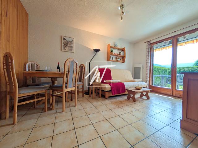 Appartement en rez de jardin à proximité du village