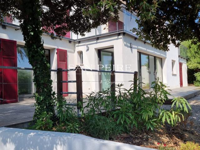Appartement en rez de jardin de Villa