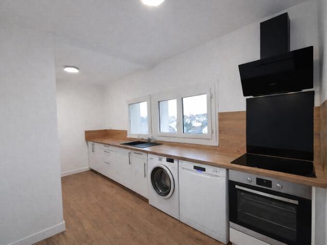Appartement entièrement rénové centre ville stationnement sécurisé balcon 2 chambres