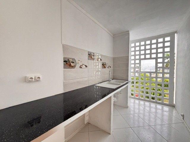 Appartement entièrement rénové sur Pointe à Pitre ! Longfort Immobilier