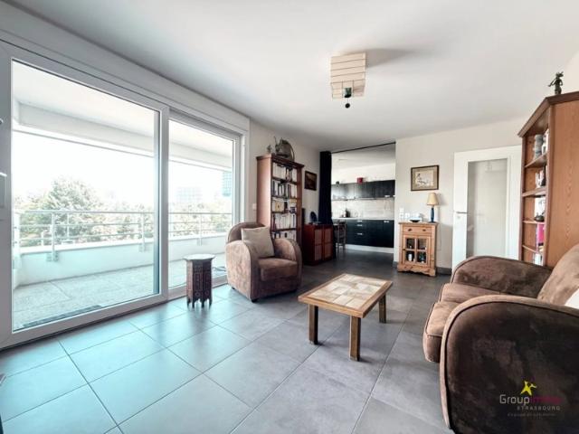 Appartement F3 avec ascenseur, parking et terrasse