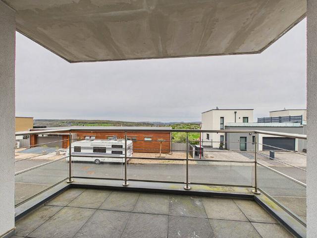 Appartement F3 avec balcon et 2 garages Bien idéal
