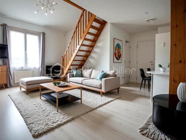 Appartement F3 DUPLEX avec place de parking privative. Orée du bois