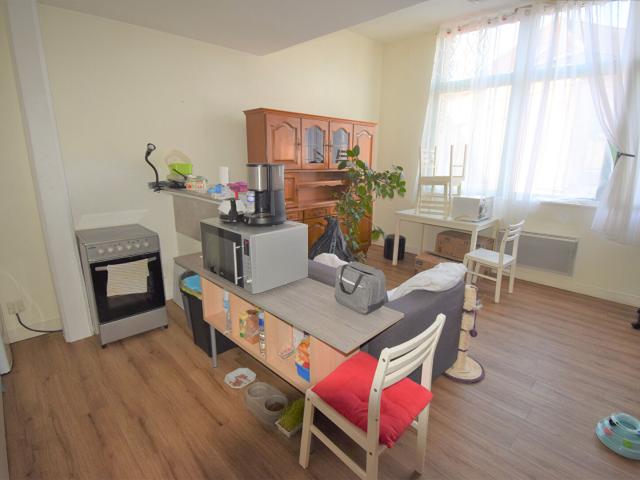 Appartement F2 en résidence calme et sécurisée avec place de parking