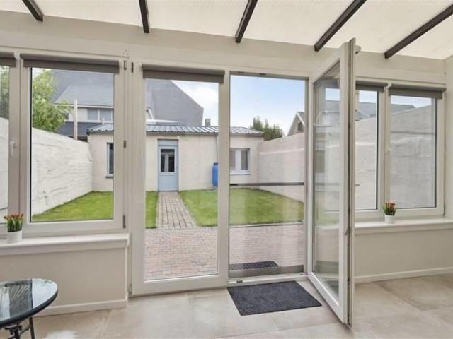 Appartement gelijkvloers met tuin