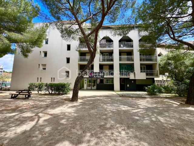 Appartement lumineux avec balcon au cœur d'une résidence arborée