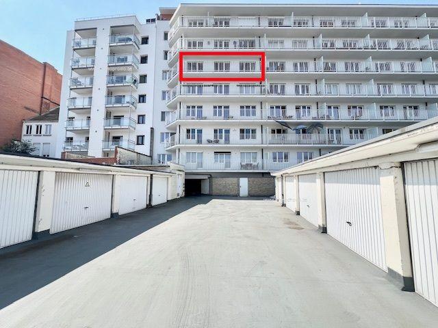 APPARTEMENT MET GARAGE OP SCHITTERENDE LOCATIE AAN HET WATER VAN DE COUPURE
