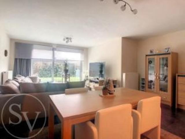 Appartement met tuin 2 slpk en garage