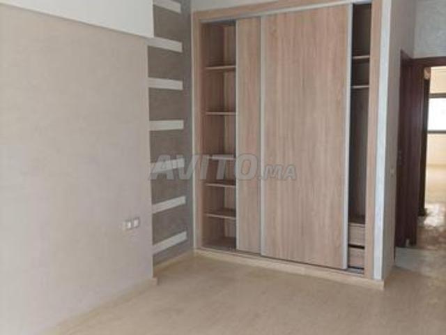 Appartement propre avec parking et ascenseur