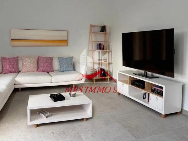 Appartement rénové rez de jardin, de 23,2 m2 avec parking