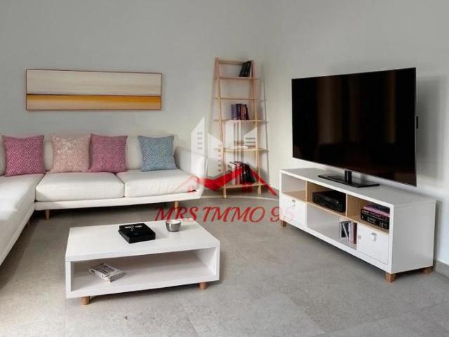 Appartement rénové rez de jardin, de 23,2 m2 avec parking