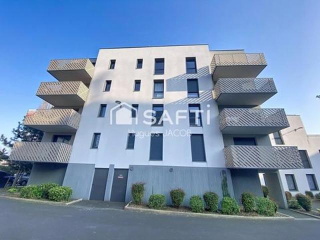 Appartement récent avec balcon et place de parking privative
