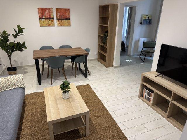 Appartement rez de chaussée avec terrasse, cave et cellier