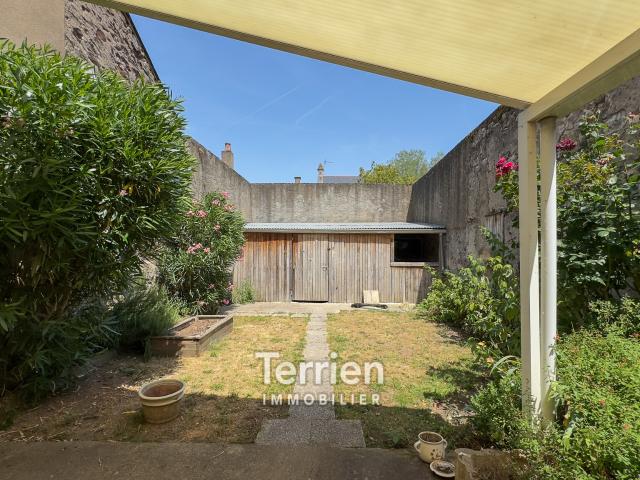 Appartement spacieux avec jardin et garage