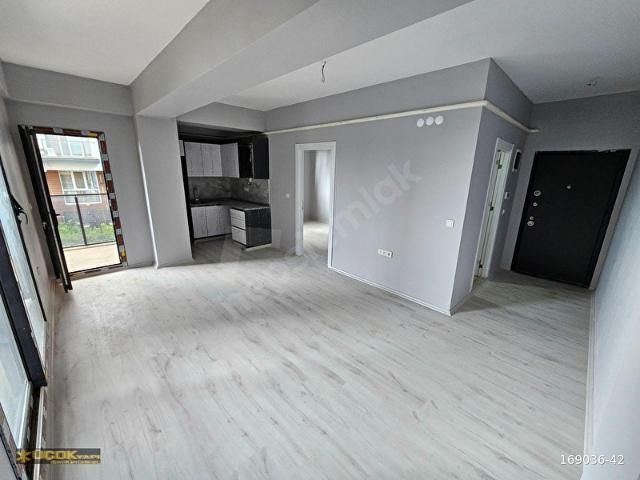 ARA KAT BALKONLU KÖŞE KONUMLU GENİŞ 1+1 SIFIR DAİRE