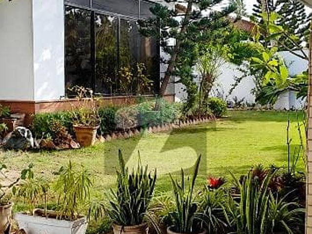 Architectural masterpiece: 1000 sq yd owner built naseem najmi bungalow for sale on b street, dha phase 5