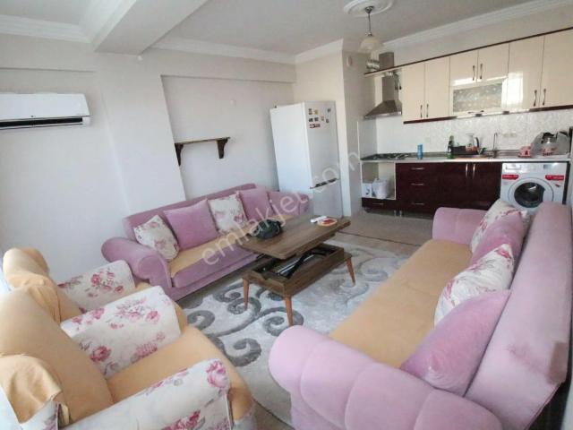 Arga'dan Buca Üçkuyular Meydanda Eşyalı 1+1 Satılık Daire