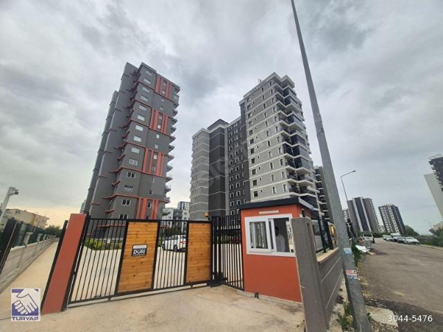 ARPAÇBAHŞİŞ ADELİA KONUTLARINDA HAVUZLU MANZARALI SIFIR 1+1