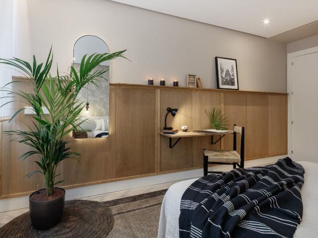 Artful 2 Bedroom Haven in Almagro with Indonesian Aesthetics and Dedicated Workspaces, Madrid Amsterdam Apartments for Rent