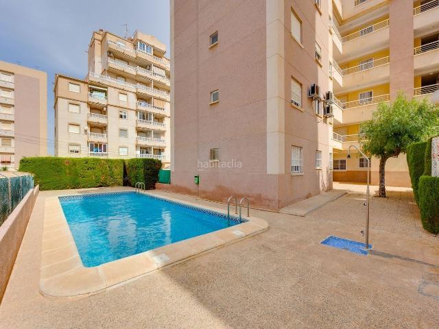 Ático en venta en Torrevieja, Nueva Torrevieja. Ático en última planta con piscina y vistas despejadas a 15 minutos de la playa. Áticos.