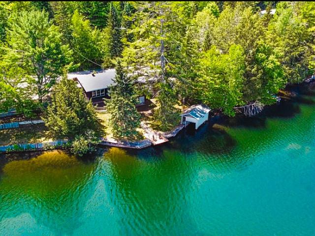 Attention Investors waterfront Cottage For Sale Lac Johnson Qc
