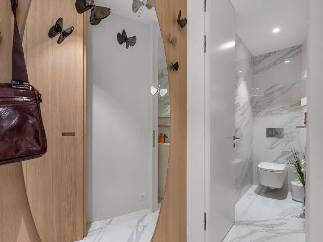 Attic flat with 3.5 rooms on sale in Paradiso 140 m² | dreamo. Ch