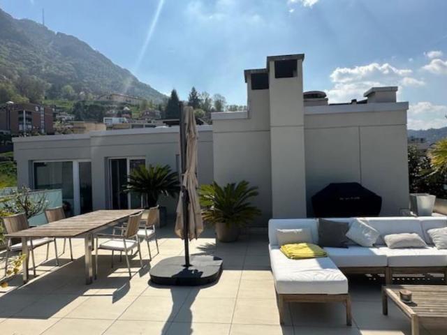 Attic flat with 4.5 rooms on sale in Paradiso 120 m² | dreamo. Ch