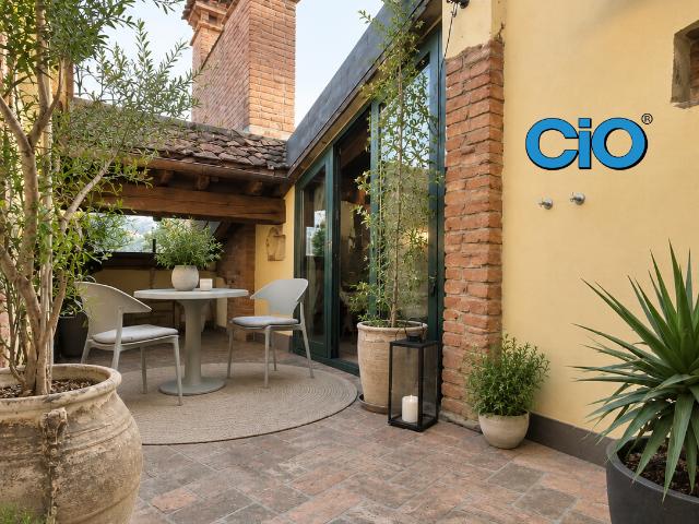 Attico con giardino a Bologna