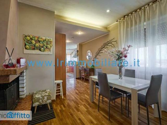Attico arredato con terrazzo Saxarubra, labaro, prima porta