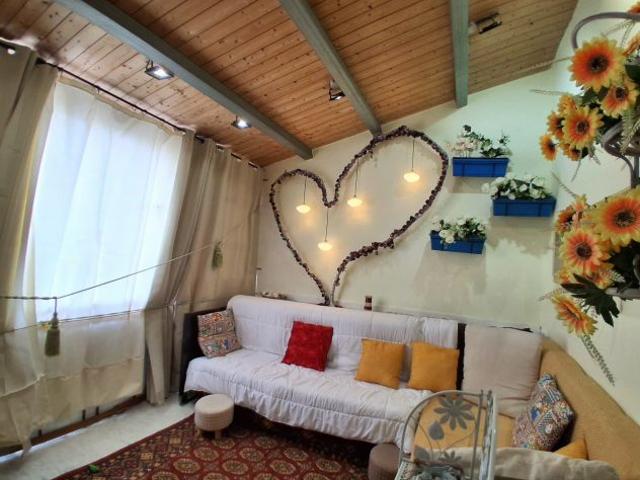 Attico di charme con veranda