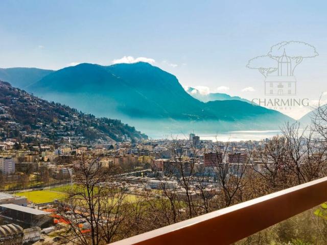 Attico Panoramico a Porza