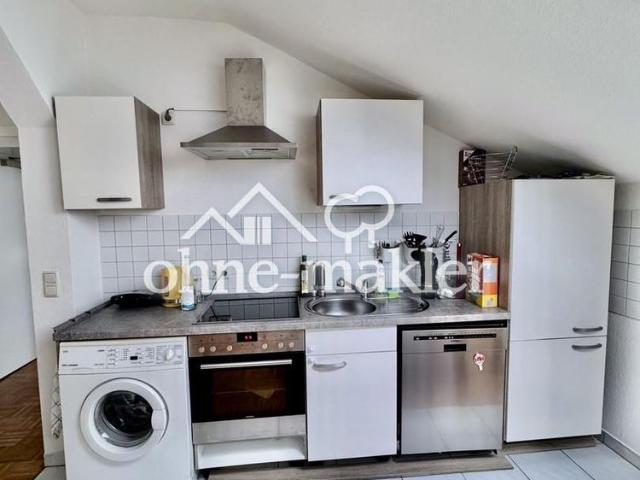 Attraktive Dachgeschosswohnung in charmanter Stadtvilla