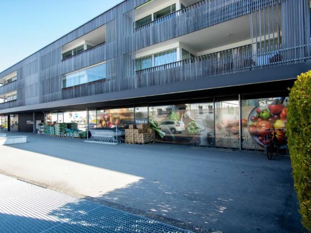 Attraktive Gewerbeinvestition mit langfristigem Ankermieter im Zentrum von Schmitten