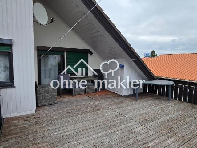 Attraktive, helle Dachgeschosswohnung mit großer Terrasse