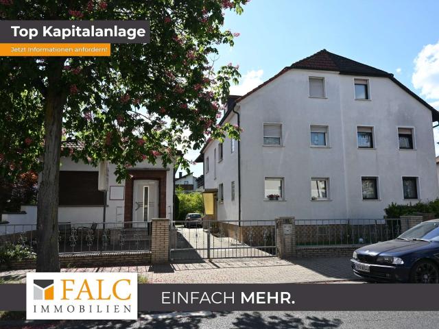 Attraktive Kapitalanlage mit großem Potenzial – Zweifamilienhaus und Gewerbefläche in Dietzenbach!