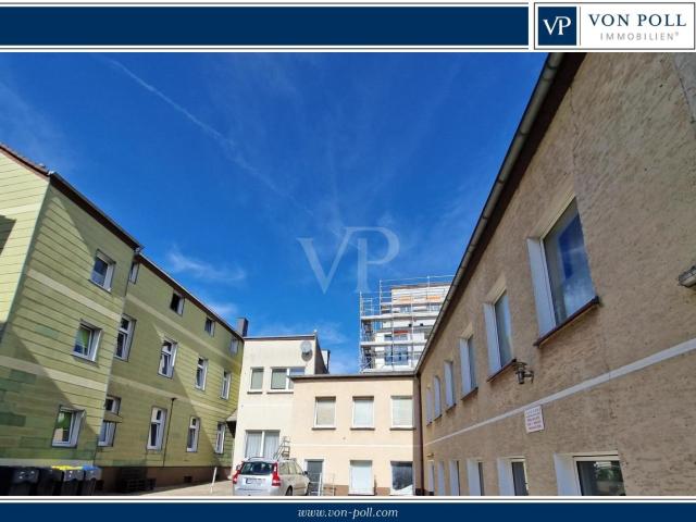 Attraktives Immobilienportfolio: 11 Wohnungen, 11 Garagen und 4 Stellplätze in zentraler Lage