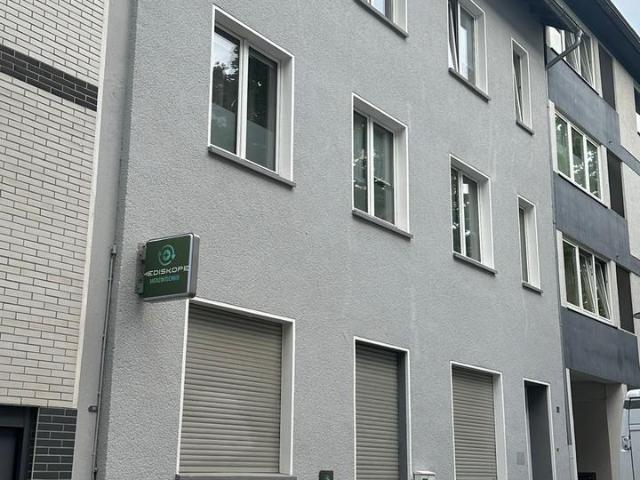 Attraktives Mehrfamilienhaus mit Büroflächen