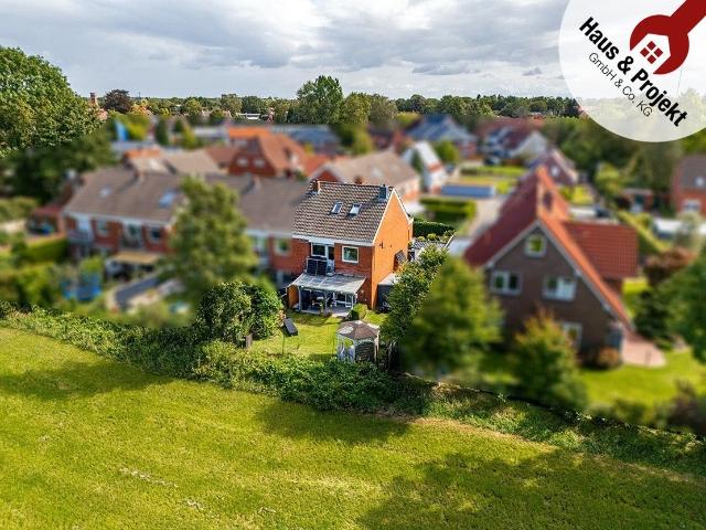 Attraktives Reihenendhaus in Aurich Ruhig Wohnen mit Blick ins Grüne und nur wenige Gehminuten bis zur Innenstadt