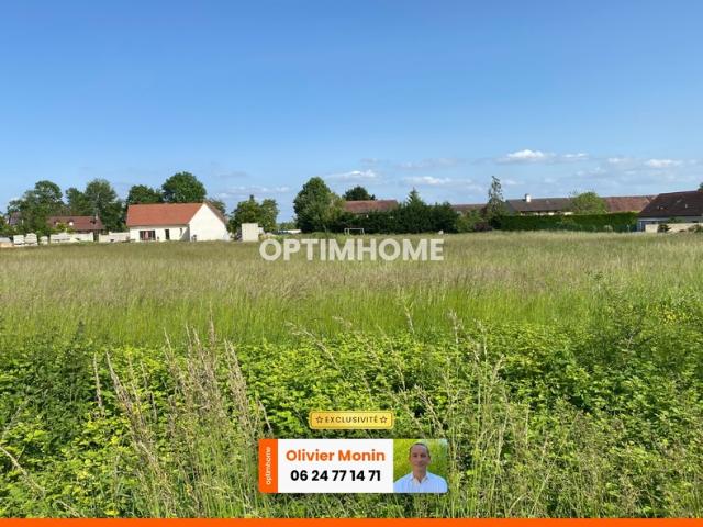 Au calme, cœur de village, terrain constructible et viabilisé de 848 m2