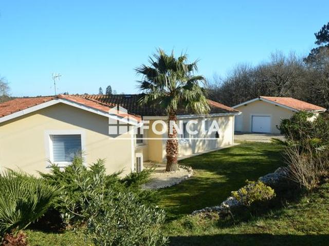 Propriété d'exception de 172 m² avec piscine sur un parc arboré de 7 400 m²