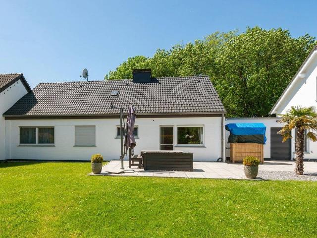 Ausbaufähiges Einfamilienhaus für vielseitige Wohnansprüche mit grüner Ruheoase