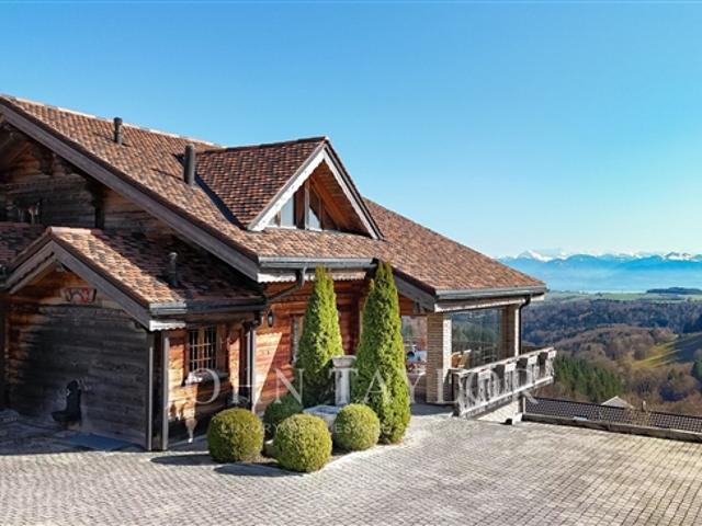 Außergewöhnliche Villa mit alpinem Charme und atemberaubender Aussicht