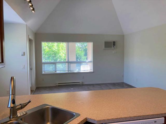 Avail. July 1st: Top Floor, Corner 2 bed, 2 bath unit