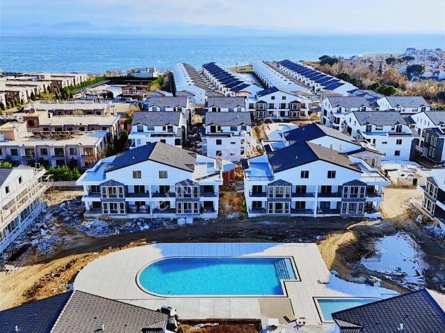Avcı'dan Denize Sıfır 30,000m2 İçinde Ara Kat Bahçesiz Acil 2+1