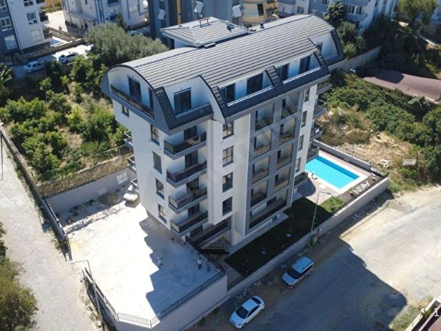Avsallar'da Satılık 1+1 Daire, Zemin Kat, 52m, Havuzlu