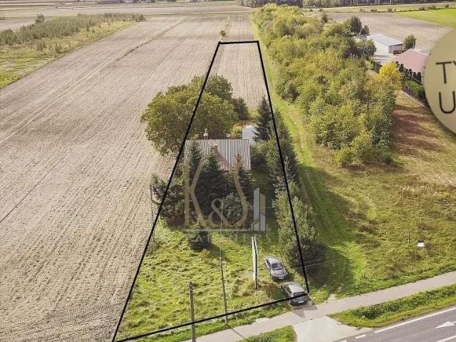 Działka 2938 m² z budynkiem do remontu w Błoniu