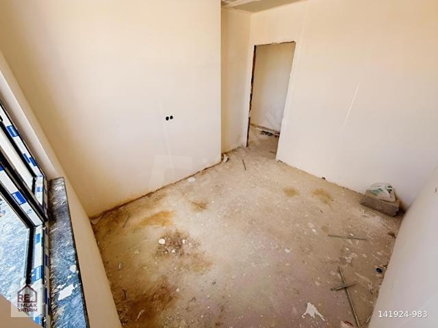 BAĞLICADA TEK BLOK OTOPARKLI YERDEN ISITMALI 2+1 SATILIK DAİRE