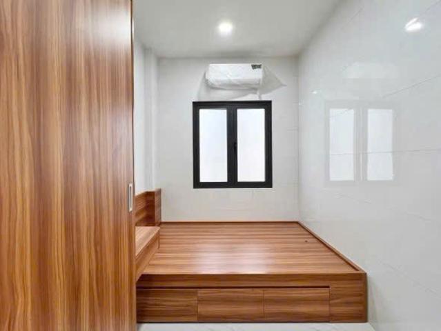Bán CHDV 4 lầu hẻm 1 sẹc 310 Dương Quảng Hàm ngang 4.5m 86m2 9PN khoán 30tr chỉ 11.5 tỷ