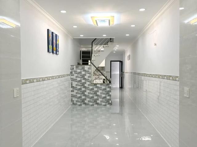 Bán nhà mới xây 2 tầng sát HXH 137 Âu Dương Lân P2Q8