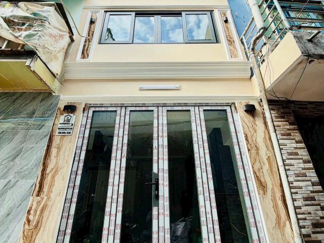 Bán nhà mới sát mặt tiền tôn đản q4 đúc 3 tấm có 3đ